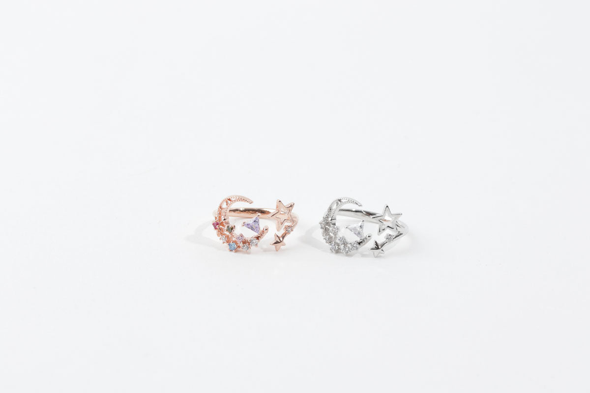 Two rings with star designs on a white background